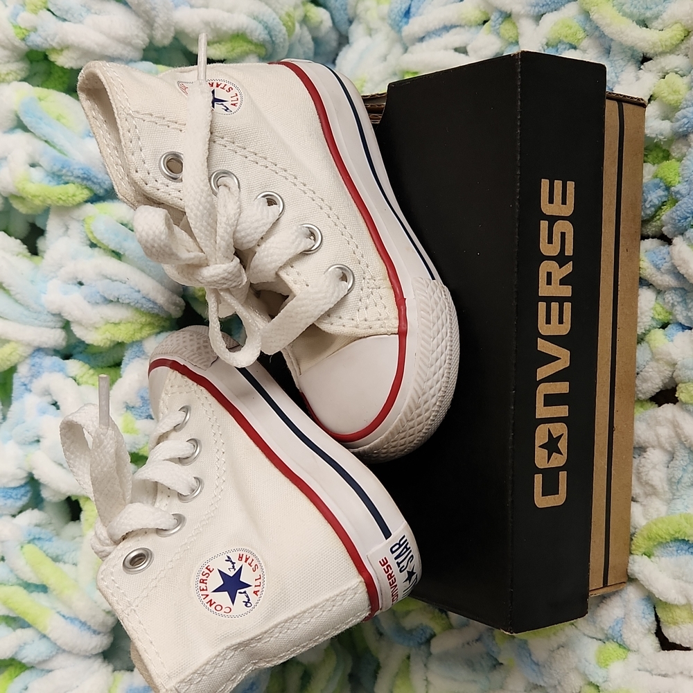 Infant high top white Converse shoes